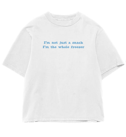 Light blue bold text ‘I’m not just a snack – I’m the whole freezer’ on cute white aesthetic boxy t-shirt.