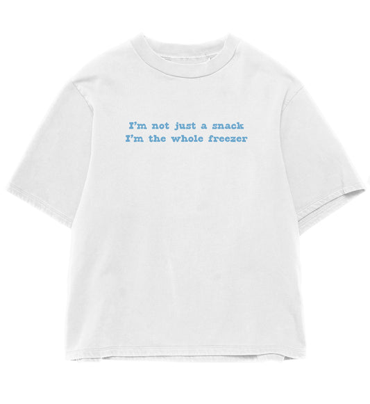 Light blue bold text ‘I’m not just a snack – I’m the whole freezer’ on cute white aesthetic boxy t-shirt.